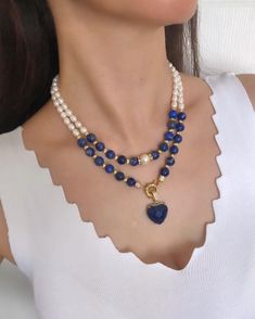 Lapis Lazuli and Genuine Freshwater Pearl Beaded Multistrand Navy Blue Necklace Set for Women, Lapis Lazuli Heart-Shape Pendant ✅ NECKLACE FEATURES * Handmade item * Materials: 8 mm navy blue high quality lapis lazuli natural stone, Genuine Freshwater Pearl, gold-plated dorica and details * Pendant: heart-shaped lapis lazuli * Length: first strand: 41 cm/16 inches + 5 cm/2 inch, second strand: 46 cm/18 inches + 5 cm/2 inch adjustment chain. If you need a longer additional extension chain, please inform me.  * There may be some color discrepancies due to different monitor settings. * Please note that natural stones may vary slightly in size, shape, and color tones from each other due to their natural characteristics. These small differences make your jewelry special and unique. ⭐️ This eleg Blue Necklace Set, Grandma Birthday Gift, Pearl Beaded Necklace, Heart Shaped Pendant Necklace, Birthday Gifts For Grandma, Pendant Heart, Grandma Birthday, Color Tones, Blue Lapis