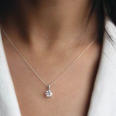 Complete any look in sparkling style with this effortless diamond pendant. Crafted in 14K white gold, this lab grown stud earrings showcases a scintillating 1ct  diamond solitaire. Polished to a bright shine, this pendant suspends along an extender cable chain that secures with a lobster clasp. Timeless Everyday Solitaire Necklace With Prong Setting, Timeless Solitaire Necklace For Everyday, Timeless Everyday Solitaire Necklace, Elegant Silver Solitaire Necklace With Lab Grown Diamond, Dazzling Silver Solitaire Necklace With Lab Grown Diamond, Elegant Silver Solitaire Necklace With Lab-grown Diamond, Elegant Silver Solitaire Necklace, Timeless Moissanite Solitaire Necklace, Timeless Solitaire Moissanite Necklace