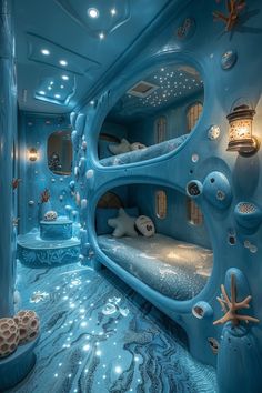 a bedroom with blue walls and flooring is decorated in an underwater theme, while the bed has been made to look like a submarine ship