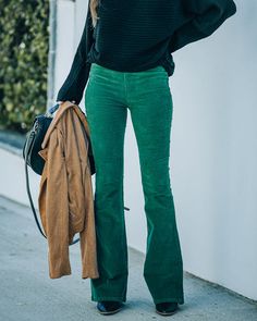 True to Size 97% Cotton and 3% Spandex Hand Wash Cold. Dry Flat High Rise Elastic Waistband Wide Pant Leg Corduroy Fabrication No Closures Not Lined Corduroy pants deliver such a fall vibe! Our Sophie High Rise Bell Bottom Corduroy Pants come in a green hue. Designed with bell bottoms and a high rise waist. Finished with an elastic waistband. Styled with the Chloe Mini Necklace. Compass Coin Necklace. Simple Bangle Bracelet. Highland Bag. Market Jacket. This Time Around Ribbed Dolman Sweater. an Green Fitted Corduroy Bottoms, Fitted Green Corduroy Bottoms, Spring Corduroy Full Length Pants, Full Length Green Pants For Fall, Green Corduroy Full-length Bottoms, Green Full-length Corduroy Bottoms, Green Full-length Bottoms For Fall, Full Length Green Corduroy Bottoms, Stretch Corduroy Mid-rise Jeans