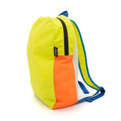 Experience the ultimate in convenience and sustainability with our Upcycled Packable Backpack in Electric Yellow, perfect for your everyday transit needs. Made from high-quality sustainable materials, this backpack is not only functional but also environmentally friendly. Details: Sustainable Packable Backpack Padded Straps Fold into pocket Fabric Content: Upcycled Nylon, 3-D Knit, Upcycled Chaco® Straps Waste Diversion: 0.6 lbs. Dimensions: 19"L X 4"W X 12" H Note: Each colorway is extremely li Sustainability Education, Packable Backpack, Utility Bag, Scrap Material, Grand Rapids Michigan, Travel Collection, A Plane, Accessory Organization, At The Gym