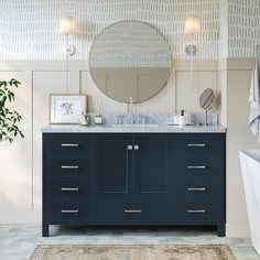 a bathroom with a large mirror above the sink and a rug on the floor next to it