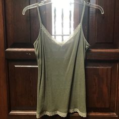 Olive Green Cotton Tank Top With Lace Trim. Never Worn. Casual Green Camisole With Lace Trim, Green Casual Camisole With Lace Trim, Spring Green Tank Top With Lace Trim, Fitted Green Camisole Tank Top, Green Bohemian Cami Tank Top, Green Cotton Tank Camisole, Olive Green Tank Top, Top With Lace Trim, Tank Top With Lace