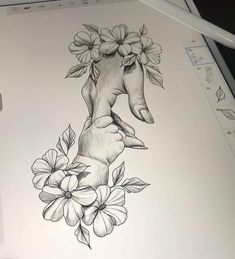 a drawing of a hand with flowers on it