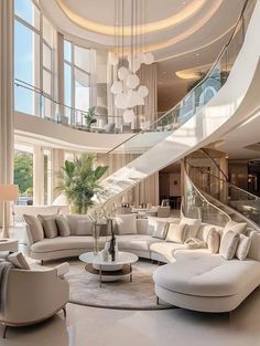 a living room filled with lots of furniture and a spiral staircase in the middle of it