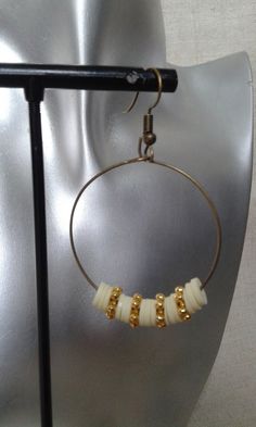 Creole earrings made with a bronze ring adorned with light yellow Heishi beads and gold metal infill beads Sizes: 3.5 cm in diameter Creole Earrings, Bronze Ring, Heishi Beads, Jewelry Earrings Hoops, Light Yellow, Favorite Jewelry, Gold Metal, Statement Necklace, Hoop Earrings