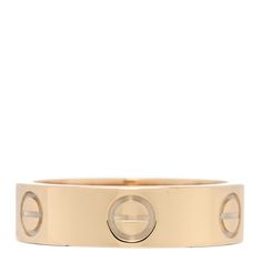 This is an authentic CARTIER 18K Yellow Gold 5.5mm LOVE Ring size 54 or 6.75. The ring is crafted of 18 karat yellow gold and features the engraved LOVE symbol motifs throughout the band. Love Symbol, Cartier Jewelry, Cartier Love, Love Ring, The Band, The Ring, Love Symbols, Cartier Ring, Cartier