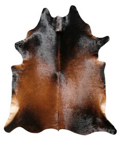 a brown and black cowhide rug on a white background