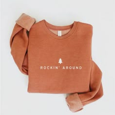 Super Soft And Cozy Burnt Orange Rockin Around Sweatshirt. Nwt Long Sleeve Fall Shirts, Holiday Sweatshirts Cricut, Western Christmas Sweatshirt, Cute Crew Neck Sweatshirts, Cute Fall Sweatshirts, Cricut Crew Neck Sweatshirt, Fall Embroidered Sweatshirts, Monochromatic Sweatshirt, Fall Sweatshirt Designs