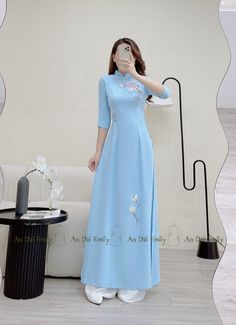 🌻Material: Lụa My Stretchy level: 5/10 🌻 The measurement of this ao dai (long dress) is in Vietnamese size (American size tends to be bigger for the same size). Please LOOK AT THE SIZE CHART CAREFULLY BEFORE ORDERING. There might have some chalk writings on the fabric due to making process. These marks can be washed away easily. 🌻🌻No returns or exchanges Buyer can contact seller about any issues with an order. 💜 Thank you very much!💜 Traditional Vietnamese Dress, Traditional Embroidered Short Sleeve Ao Dai, Fitted Ao Dai With Floral Embroidery And Stand Collar, Fitted Light Blue Ao Dai For Spring, Fitted Short Sleeve Ao Dai With Floral Embroidery, Blue Fitted Long Sleeve Ao Dai, Fitted Blue Cheongsam For Wedding, Long Blue Ao Dai For Spring, Spring Ao Dai With Floral Embroidery And Short Sleeves