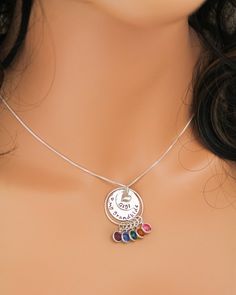 "Personalized Grandma Necklace, Grandmother Necklace, Birthstone Necklace, Love my Grandchildren Necklace, Hand Stamped, Mother's Day Gift This is a perfect Mother's Day Gift for Grandma to show off all of her children or grandchildren. A sterling silver pendant of stacked discs are hammered and hand stamped with her special grandmother name and then bottom disc can be stamped with a special message. A tiny sterling silver heart charm adorns the top of the disc. A sterling silver ring holds all Multicolor Charm Jewelry For Birthday, Multicolor Charms Jewelry For Birthday, Multicolor Birthday Jewelry With Charms, Handmade Sterling Silver Birthstone Necklace For Birthday, Sterling Silver Charm Name Necklace For Birthday, Multicolor Jewelry For Mother's Day Birthday Gift, Silver Dangle Necklaces For Birthday, Multicolor Name Necklace For Birthday, Personalized Multicolor Pendant Jewelry