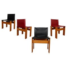 four chairs with black and red leather seats on each one, all in different colors