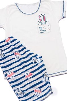 If you´re a bunny lover, this set is for you! Enjoy the cute print on these capri pajama set, the bunny peeking out of your pocket ads to the look and lots of little bunnies on the striped pants. Our bunny set is cute and super comfortable and also comes in kids for twining nights What we love about it: The pastel colors and cool details Fit: This pj set fits true-to-size.Length: Top hits on the hips and capris go below the knee.Bust: The top is fitted-recommended for any cup.Waist: Fitted-Elast Spring Cartoon Print Loungewear Sets, Spring Bedtime Sets With Cartoon Print, Spring Cartoon Print Sets For Bedtime, Playful White Pajama Shorts For Pajama Party, White Cartoon Print Sleepwear Set, White Graphic Print Sleep Set, White Graphic Print Pajama Party Sets, Cute Matching Pajama Sets For Sleep, Cute Matching Sleepwear Sets