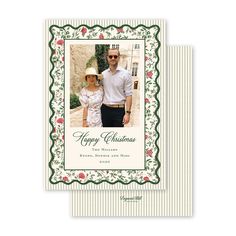 two people standing next to each other in front of a christmas card with the words happy christmas