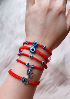 Cheap Adjustable Evil Eye Bracelet, Traditional Resizable Jewelry For Friendship, Handmade Spiritual Round Friendship Bracelets, Handmade Adjustable Wristband, Handmade Adjustable Round Wristband, Resizable Beaded Bracelets As Gift, Adjustable Evil Eye Bracelet With Sliding Knot, Adjustable Spiritual Evil Eye Bracelet With Sliding Knot, Adjustable Round Spiritual Evil Eye Bracelet