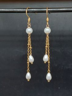 '''New collection'''  Model Mina Pretty pair of earrings for bride, wedding earrings   Fine beaded chain and hooks in stainless steel (gold or silver) White pearly glass beads (or ivory) drop and round shape, Czech crystal beads Height including hooks: approximately 5cm       Delivered in gift packaging, ideal for giving! Earrings For Bride, Pearls Wedding, Czech Crystal, Wedding Jewelry Earrings, Bride Wedding, Wedding Earrings, Bridal Earrings, Beaded Chain, Gift Packaging