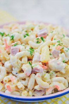 a plate full of macaroni salad on a table