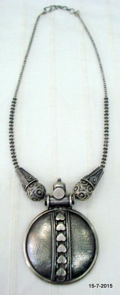 Vintage Antique tribal old silver necklace from Rajasthan India. Great handmade design, good for jewellery collection.heart. paLength - 46 cm (18.1") we can adjust the length.pendant size max. - 7.4/5 cm (2.9/1.96")weight - 66.5 grams material - silver. Antique Oxidized Silver Necklace, Heavy Antique Silver Necklace, Antique Silver Necklace For Festivals, Antique Finish Silver Temple Necklace As Gift, Antique Silver Necklaces For Festivals, Antique Silver Engraved Temple Necklace, Silver Temple Necklace With Antique Finish As Gift, Antique Silver Metal Necklaces For Rituals, Vintage Silver Necklaces For Rituals