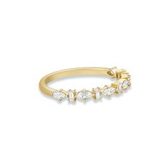 a yellow gold ring with five diamonds