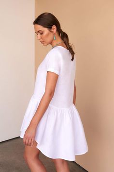 Fácil Blanco | Lena Dress – Facil Blanco White Linen Short Sleeve Mini Dress, White Linen Mini Dress With Short Sleeves, Chic Flowy Linen Dress, White Linen Mini Dress For Day Out, White Breezy Dresses With Relaxed Fit, White Breezy Dress With Relaxed Fit, Linen Short Sleeve Mini Dress For Summer, Summer Linen Mini Dress With Short Sleeves, White Relaxed Fit Mini Dress For Daywear