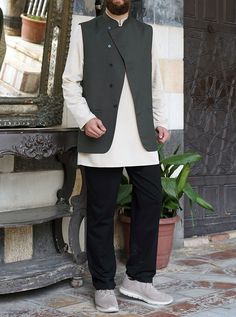 Open mandarin collar Angled crossover buttoned front 2 horizontal front welt pockets Fully lined Item Code: mW0901 Model is 168cm (5 feet 6 inches) and wearing size M Semi-formal Nehru Jacket With Stand Collar, Nehru Jacket With Stand Collar For Work, Stand Collar Vest For Workwear In Fall, Classic Single Breasted Nehru Jacket With Stand Collar, Classic Nehru Jacket With Stand Collar, Casual Fitted Nehru Jacket For Spring, Winter Workwear Vest With Stand Collar, Semi-formal Nehru Jacket With Stand Collar And Buttons, Fall Nehru Jacket With Stand Collar And Button Closure