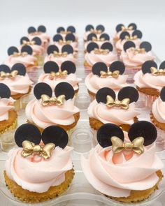 there are many cupcakes with minnie mouse ears on them