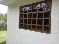 an open window on the side of a house