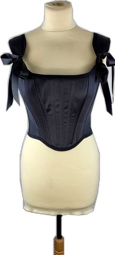 Black Boned Bodice Corset Belt For Party, Black Party Corset Belt With Boned Bodice, Black Corset Belt With Boned Bodice For Party, Elegant Black Corset Belt With Boned Bodice, Black Underbust Corset With Adjustable Straps, Black Stretch Corset With Straps, Sleeveless Black Boned Bodice, Black Overbust Corset For Evening, Party Corset With Straps In Nylon