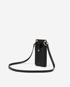 Modern Black Phone Shoulder Bag, Black Phone Bag For Daily Use, Black Business Phone Bag Pouch, Elegant Phone Bag With Cell Phone Pocket For Everyday, Elegant Everyday Phone Bag With Cell Phone Pocket, Black Leather Phone Bag With Adjustable Strap, Modern Black Phone Bag With Adjustable Strap, Classic Phone Bag With Cell Phone Pocket, Classic Shoulder Phone Bag With Cell Phone Pocket