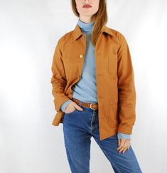 "Unisex 60s Style French Chore Jacket Duck Brown Cotton Canvas - Various Sizes Available - Made from 100% canvas cotton with tarnished antiqued bronze button rivets, buttoned cuffs and 4 useful pockets to the front. - Really easy to pair with jeans and boots or a dress. - Unisex garment. ABOUT Made to a 100% unique design specification, as designed by us at Wolf Vintage; not to be found anywhere else on the market, online or in store. Having specialised in selling vintage navy chore jackets or ' Fall Utility Jacket For Workwear With Buttons, Cotton Blazer With Snap Buttons For Fall, Brown Collared Utility Jacket With Button Closure, Fall Utility Blazer With Buttons, Classic Brown Utility Jacket With Buttoned Pockets, Brown Collared Utility Jacket With Buttons, Cotton Button-up Outerwear With Double Button Closure, Brown Utility Outerwear With Snap Buttons, Retro Long Sleeve Outerwear With Double Button Closure