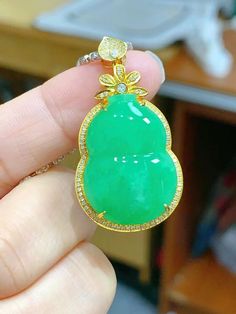 This listing is for a rare, apple green jade pendant. It is made of natural, type A jadeite. The setting is made of 18K solid yellow gold and natural diamonds. --DETAILS-- Grade: Natural, untreated, type A Jade type: Jadeite Color: Green (apple) Degree of translucency: MEDIUM-HIGH Jadeite stone condition: No cracks or other imperfections Jade gourd size: 24.8x17.8mm / Total size: 39.2x20.9x9.6mm Item SKU: PPY-0098 --CERTIFICATION-- This process takes about 5-7 days depending on the Gem Testing L Exquisite Green Jade Jewelry, Lucky Stone, Apple Green, Jade Pendant, Green Jade, Green Apple, Stone Pendant, Jade Green, Color Shades