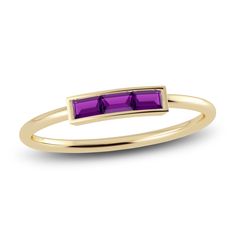 A sleek row of three baguette-cut natural amethyst gemstones modernizes this striking bar style ring from the Juliette Maison™ collection. Fashioned in 10K yellow gold, the bezel set stones make a bold but elevated statement with its minimal design. Modern Emerald Cut Amethyst Ring, Jared The Galleria Of Jewelry, Baguette Ring, Bar Ring, Bar Styling, Rhodolite Garnet, Garnet Rings, Baguette Cut, Garnet Gemstone