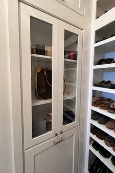 a closet with shoes and handbags in it