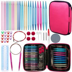 a pink case filled with lots of different types of pens and scissors next to each other