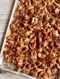 the meat is being cooked on the baking sheet and ready to be baked in the oven