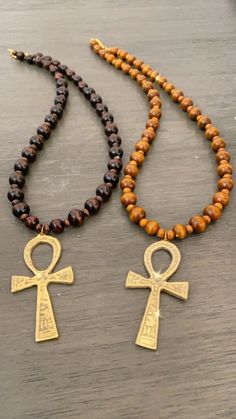 A Simple and Stylish Ankh Necklace 24 inch with Gold Plated Lobster Clasp Dark or Light Brown Glossy Wood Beads 3 Inch Solid Brass Ankh Pendant Peace Light, Ankh Pendant, Ankh Necklace, Wood Beads, Light Brown, Luxury Branding, Solid Brass, Lobster Clasp, Cross Necklace