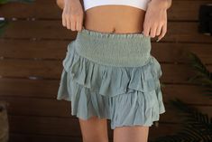 Jade tiered skirt featuring high waist, layered overlay, smocked detailed waistline, and lined shorts underneath! 62% RAYON 38% POLYESTER Sizing - Runs SMALL, so size up! Fun Time, Tier Skirt, Tiered Skirt, Good Times, Smocking, Jade, High Waist, High Waisted, Skirt