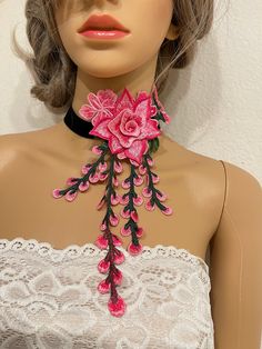 "Embroidered flower choker  Size: 16\" with 3\" extender  Flower 4.5\" by 9\"  Please let us know if you need different sizes  Returns & exchanges We don't accept returns or exchanges. But please contact us if you have any problem with your order. Request a cancellation within 24 hours of purchase The following item can't be returned or exchanged  Because  of the nature of these items, unless they arrive damaged or detective, I can't except returns for: Custom or personalized orders Perishable p Spring Flower Choker Necklace, Pink Choker Jewelry For Spring, Adjustable Pink Choker For Party, Pink Adjustable Choker For Party, Spring Pink Choker As A Gift, Pink Choker Necklace For Spring, Spring Party Pink Flower Necklace, Pink Handmade Flowers Necklace For Party, Adjustable Pink Flower Necklace For Wedding