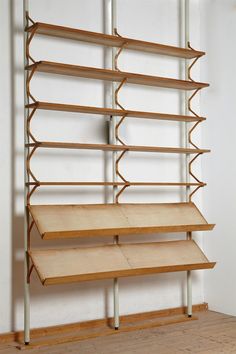 the shelves are made out of wood and metal