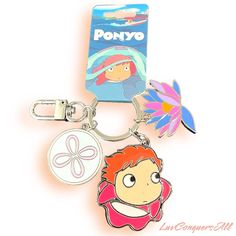 the ponyo keychain has two charms attached to it's front and back sides