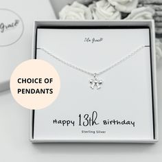 Perfect gift for a happy 13th birthday gift. Sterling silver necklace with your choice chain length and pendant, choose from the music note, paw print, rabbit, mini heart, flower, rabbit or bow. It comes in a luxury white jewellery box, the necklace will be attached to the card, this slots inside a resealable clear bag and then fits perfectly in the jewellery box.  Option to personalise the jewellery card to add a name to the top of the card, add more wording to the bottom and change the age to whatever you want.   WHAT YOU GET Necklace - sterling silver belcher chain with your choice of sterling silver pendants. Jewellery Card and Resealable Clear Bag Jewellery Box PENDANTS Music Note - 11mm Paw Print - 10mm Rabbit - 8mm Mini Heart - 4mm Flower - 7mm Bow - 11mm NECKLACE LENGTHS 14 inch 16 Silver Necklace With Gift Box For Birthday, Silver Necklace For Birthday, Sterling Silver Charm Necklace For Birthday And Mother's Day, Sterling Silver Charm Necklaces For Birthday And Mother's Day, Sterling Silver Charm Necklaces For Mother's Day And Birthday, Sterling Silver Charm Necklace For Mother's Day Birthday Gift, Silver Birthstone Necklace For Birthday And Mother's Day, Pendant Necklaces For Birthday Gift, Silver Charm Necklace For Birthday And Mother's Day