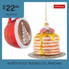 a christmas ornament with a stack of pancakes hanging from it's side