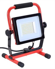 a red and black work light sitting on top of a metal stand next to a white background