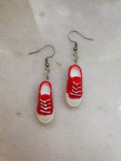 Sport shoe red earrings. W E L C O M E Welcome to Piranha Unique Jewelry! Thank you for visiting our shop. We are glad you found your way here. If you have any questions, please do not hesitate to contact us! We're more than happy to help. P R O D U C T ∙ I N F O Ear wires (standard): Hypoallergenic Surgical Stainless Steel Ear wires (option): High Quality Solid 925 Sterling Silver Size: total length with drop 40mm; charm size: 15mm M O R E ∙ F R O M ∙ U S https://www.etsy.com/shop/PiranhaUnique Handmade Red Casual Earrings, Handmade Casual Red Earrings, Casual White Shoe Charms For Gift, Casual White Shoe Charms For Gifts, Casual White Shoe Charms As Gift, Shoe Earrings, Sport Shoe, Cute Doll, Pop Style