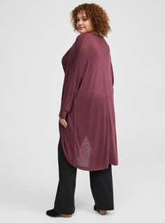 FIT Model is 5'10. 5” wearing size 1. Measures 40” from shoulder (size 2). MATERIALS + CARE Hacci knit fabric. 87% rayon, 10% polyester, 3% spandex. Machine wash cold. Tumble dry low. Imported. DETAILS Open neckline. Long cocoon sleeves. The best plus size women's hacci open front cocoon cardigan cardigans & dusters in sassafras made of hacci. Torrid is your destination for cozy fall and winter clothes to keep you warm and comfortable. Versatile Stretch Knit Cardigan, Fall Viscose Tops For Layering, Versatile Knit Stretch Cardigan, Versatile Viscose Tops For Fall, Chic Long Tops For Fall, Long Sleeve Rayon Stretch Tops, Fall Viscose Knit Top, Relaxed Fit Rayon Tops For Fall, Cocoon Cardigan