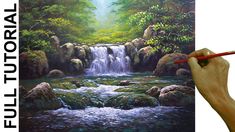 a person is painting a waterfall in the forest with water and rocks, while holding a pencil