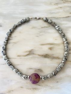 A necklace made of natural stone suitable for holidays and everyday wear, for office and concert, a gift for mom, sister, or a friend for their birthday, wedding day, Christmas, or Valentine's Day. A personalized meaningful gift based on the zodiac sign and moon phase. A large fluorite charm, 0.88 ounces in size, supports hematite beads and hematite inlays. Steel hardware, lobster clasp. The size of the dolomite stones is 8x12 mm. Lithotherapy. Gray Gemstone Beads Necklaces For Gifts, Gray Gemstone Beads Necklace For Gift, Adjustable Gray Gemstone Beaded Necklace, Adjustable Gray Necklace With Gemstone Beads, Adjustable Gray Gemstone Beads Necklace, Gray Single Strand Jewelry As Gift, Gray Single Strand Jewelry As A Gift, Handmade Spiritual Gray Necklaces, Hand-strung Gray Jewelry As Gift