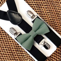 "This sage green bow tie & black suspenders set is a great choice for dusty sage bow tie, bow ties for men, sage tie for boho wedding, sage wedding bowtie, or any other special occasion. ❤ *Beautifully Compliments Davids Bridal \"dusty sage\" **Please Specify** Bow Tie Only (w/ Clip or Neck Strap), Suspenders Only, or Bow Tie Only & Susp (Bow Tie and Suspenders) SUSPENDERS- One Pair of our Quality Suspenders BOW TIE - One Bow Tie on White Adjustable STRAP or Alligator CLIP **CLIP ON Bow Ties are Adjustable Green Bow Tie For Formal Occasions, Green Tie For Wedding On Father's Day, Fitted Green Bow With Ties, Adjustable Green Tie For Party, Elegant Green Bow Tie For Father's Day, Green Adjustable Tie For Party, Adjustable Green Ties For Party, Green Bow Tie For Black Tie Events, Green Bow Tie Suit Accessories For Summer