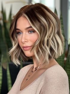 For those with a bob cut, adding blonde and caramel highlights can elevate the classic style by adding movement and dimension to brown hair. This look is perfect for both casual and formal settings, working well for people with oval or square face shapes and green or hazel eyes. The subtle blend of blonde and caramel ensures that the bob remains chic and polished without looking too bold. Brown And Blonde Highlights Short Hair, Blonde With Ash Brown Lowlights, Darker Highlights For Blonde Hair, Blonde Peekaboo Highlights For Dark Hair, Brown And Blonde Bob, Highlight And Lowlights For Brown Hair, Hair Color Hazel Eyes, Short Dark Blonde Hair With Highlights