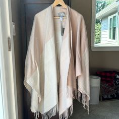 Go Soft And Sweet For Sweater Weather With This Plush Poncho From Soia & Kyo! Made With A Fun Fringed Hem And A Light And Airy Colorblocked Design In Pops Of Pink And Cream. One Size 100% Acrylic Open Front Poncho-Style Silhouette Colorblocked Design Scarf Hem W/ Fringe Trim Shoulder To Hem 39" Chic White Cape Outerwear, White Long Sleeve Cape For Spring, White Long Sleeve Spring Cape, White Shawl Poncho For Fall, Oversized White Cape Outerwear, White Long Sleeve Cape For Fall, Chic White Cape For Fall, White Shawl Poncho For Spring, Cozy White Cape For Fall